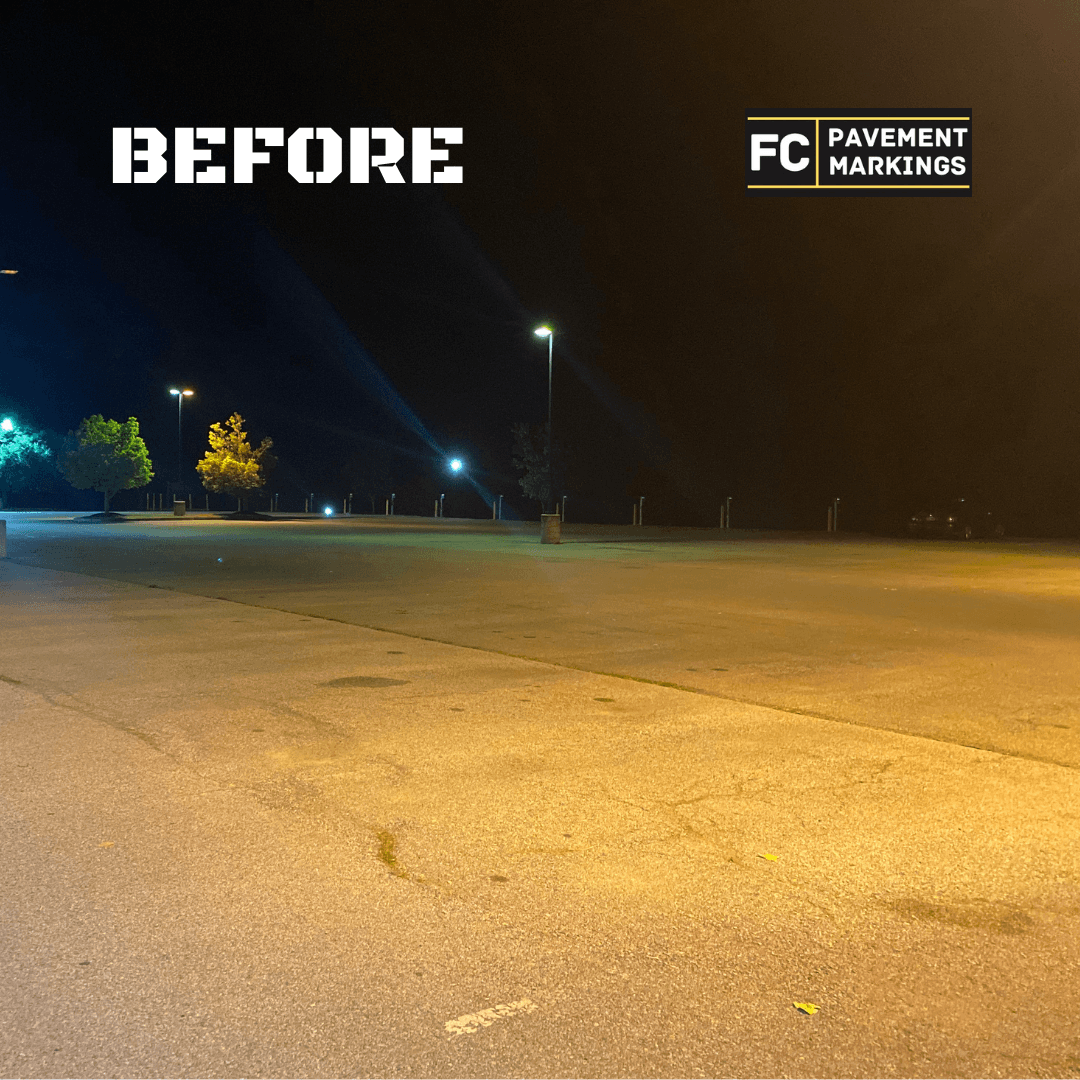 Main lot angled view showing worn pavement markings before restriping