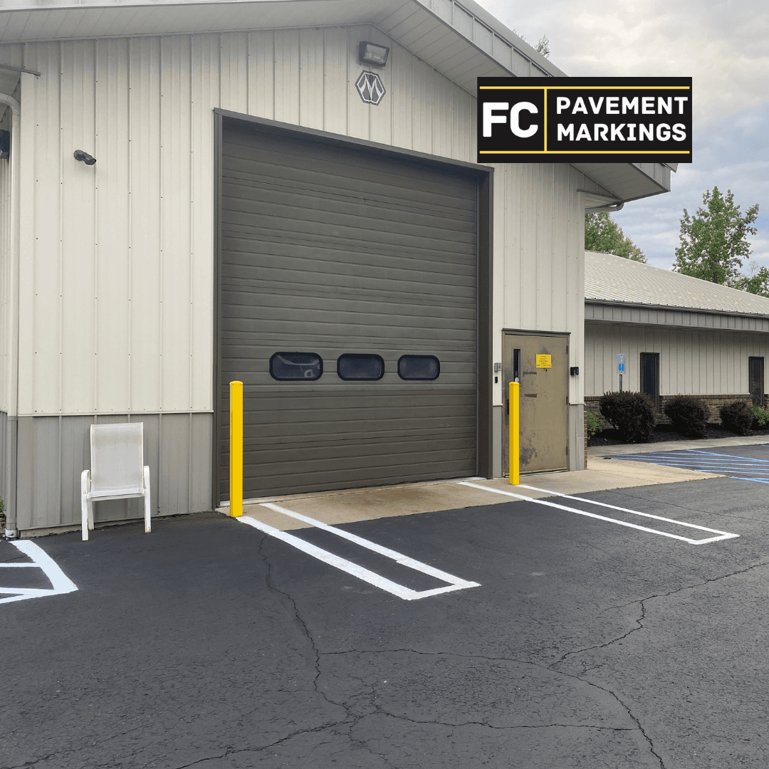 Loading dock area after bollard painting and line striping in Clifton Park NY